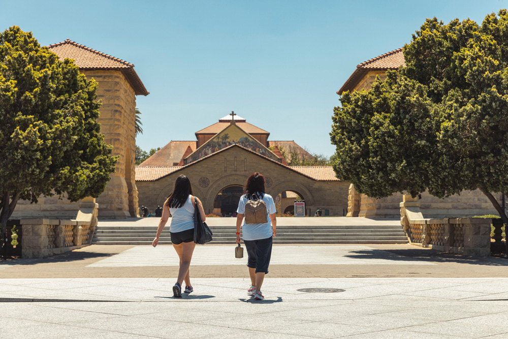 Students walking to the Quad with Memorial Church in the distance