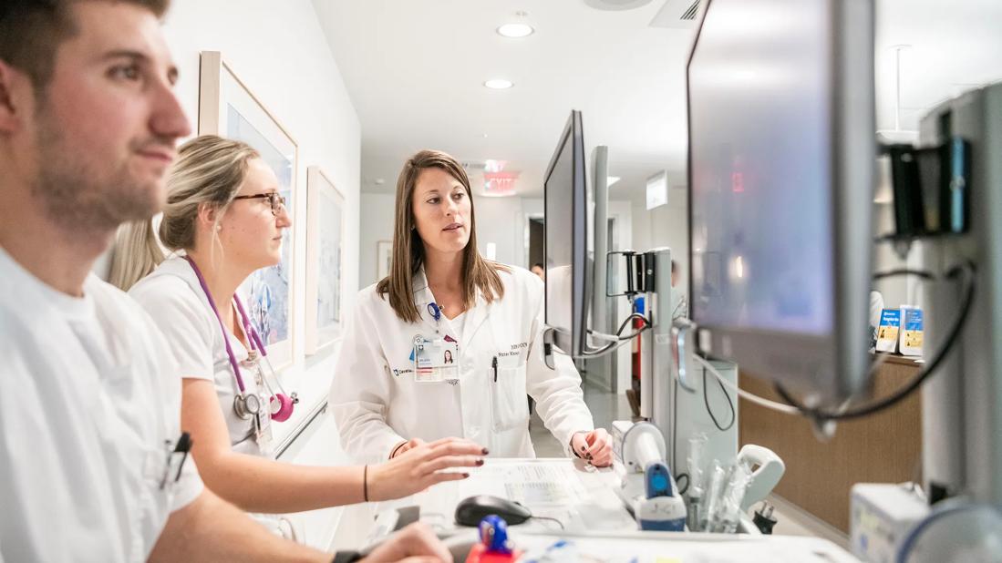 Nurses entering information onto computers