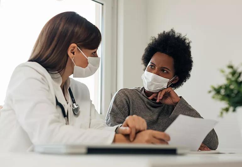 A patient discusses their test results with a healthcare provider.