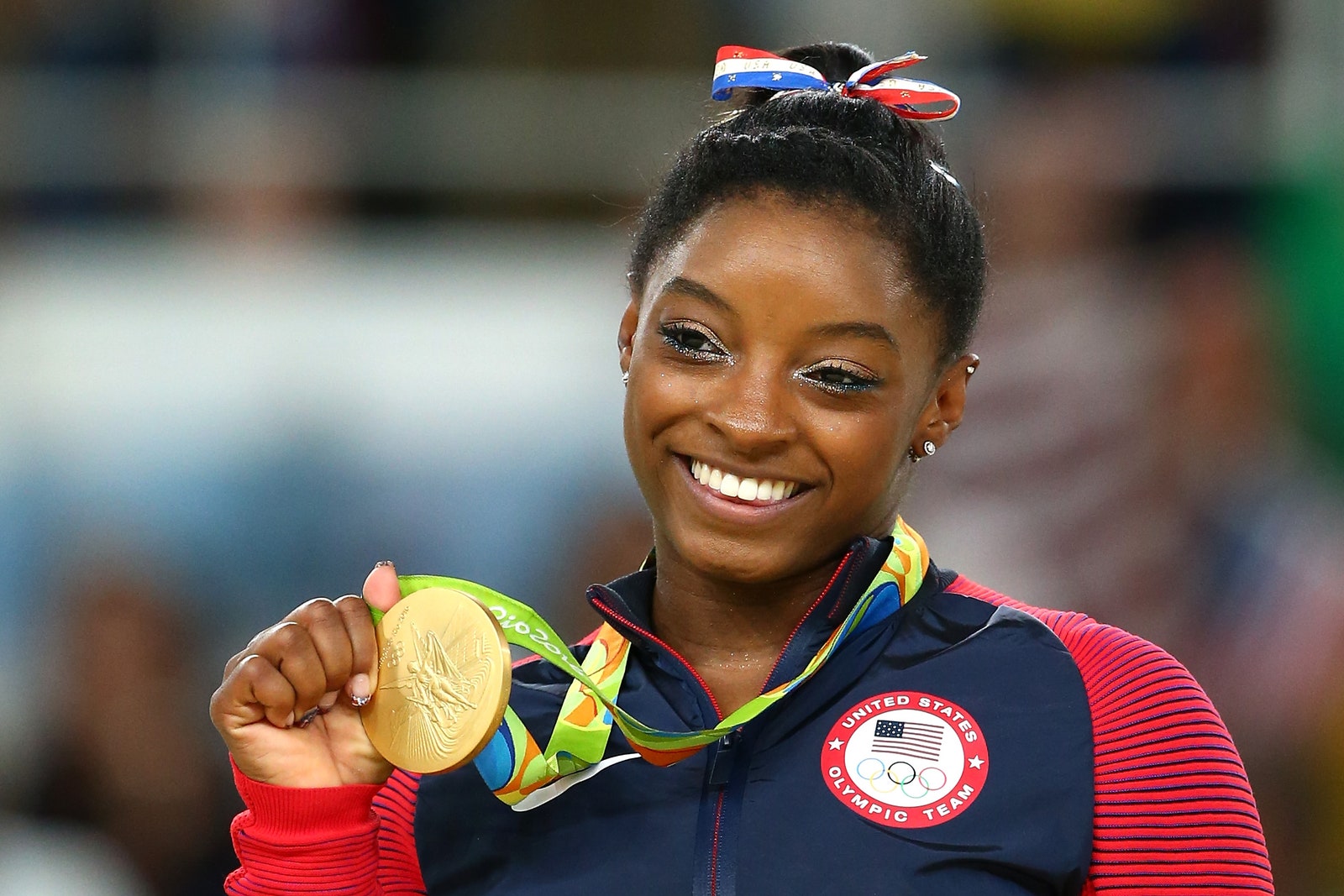 RIO DE JANEIRO BRAZIL  AUGUST 16 Gold medalist Simone Biles of the United States celebrates on the podium at the medal...