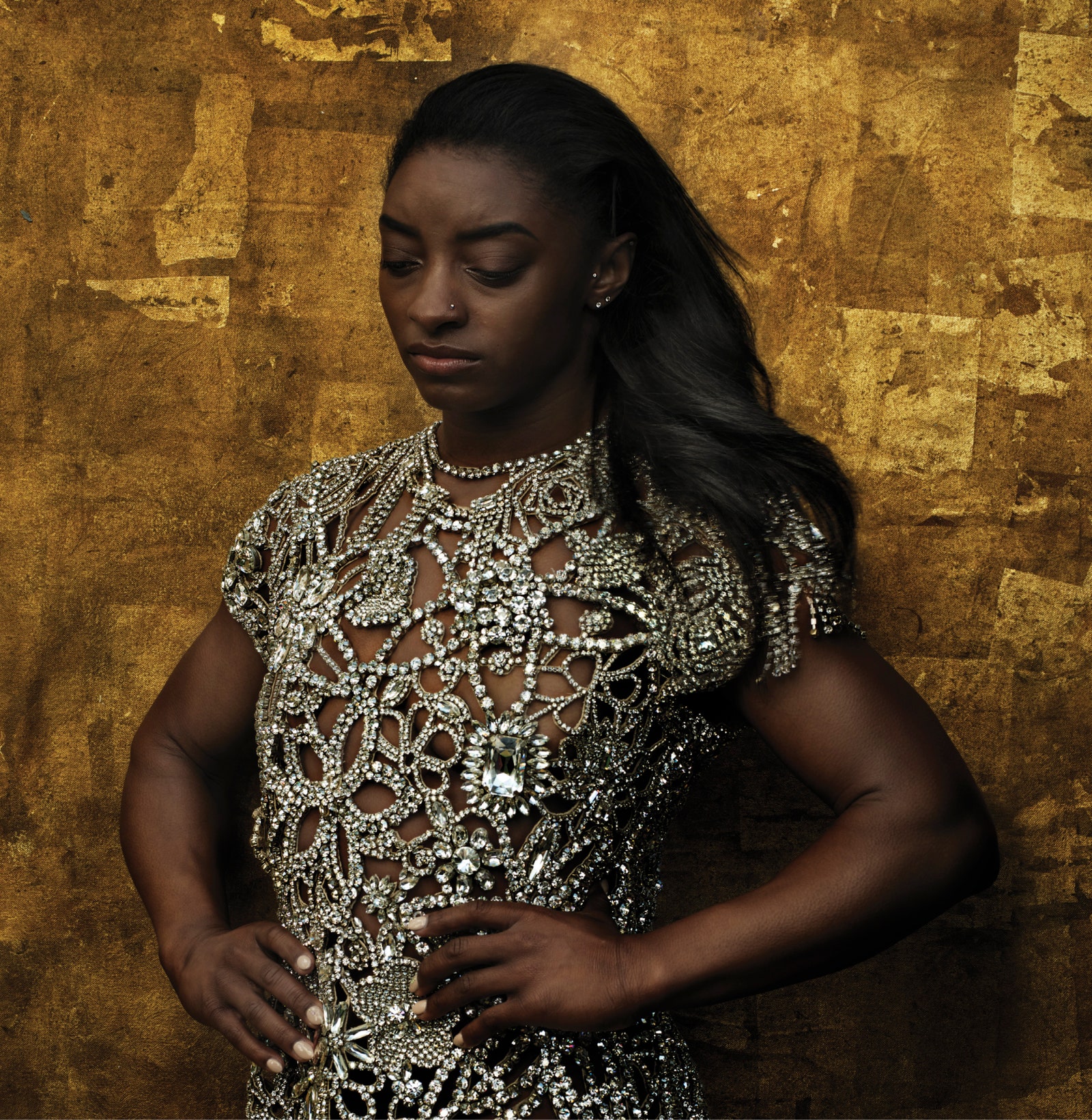 Image may contain Clothing Apparel Simone Biles Evening Dress Fashion Gown Robe Sleeve Human and Person