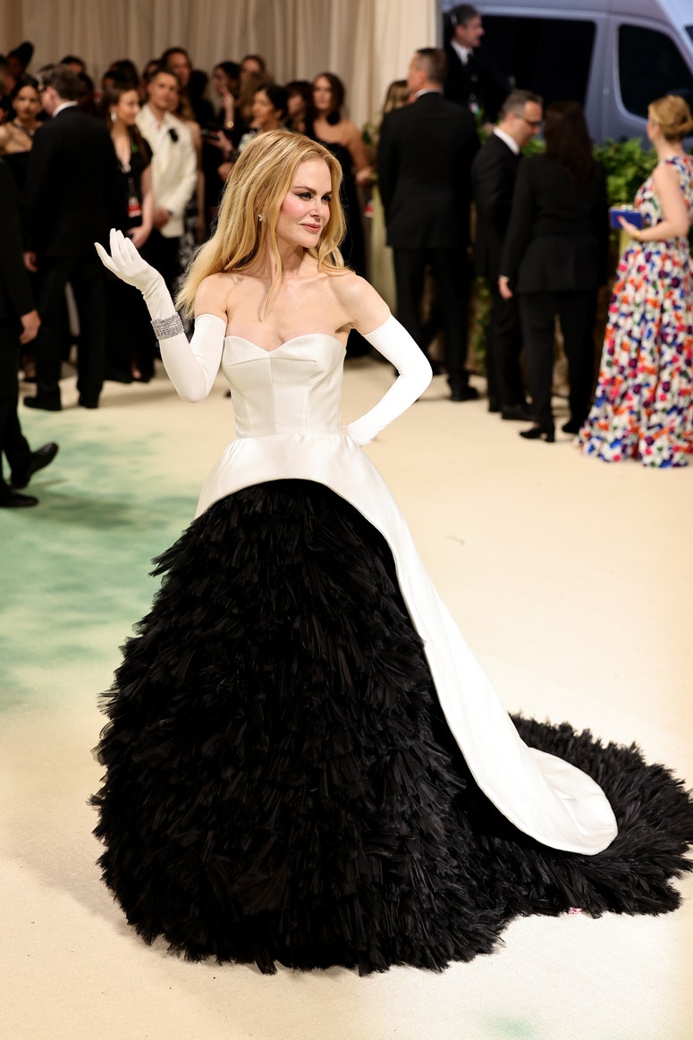 Image may contain: Nicole Kidman, Clothing, Dress, Formal Wear, Fashion, Gown, Glove, Wedding, Wedding Gown, and Person