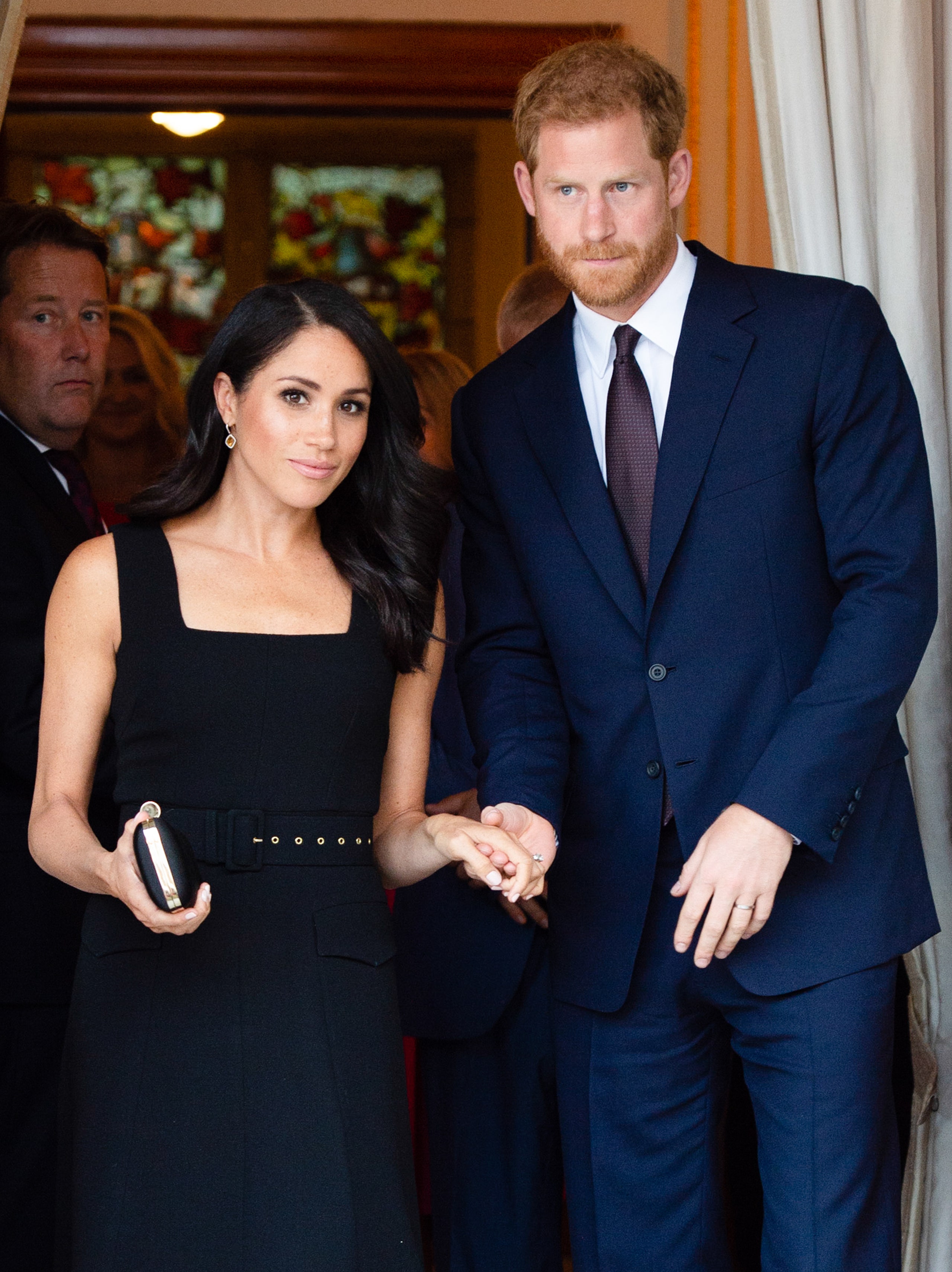 Image may contain Prince Harry Duke of Sussex Meghan Duchess of Sussex Blazer Clothing Coat Jacket and Accessories