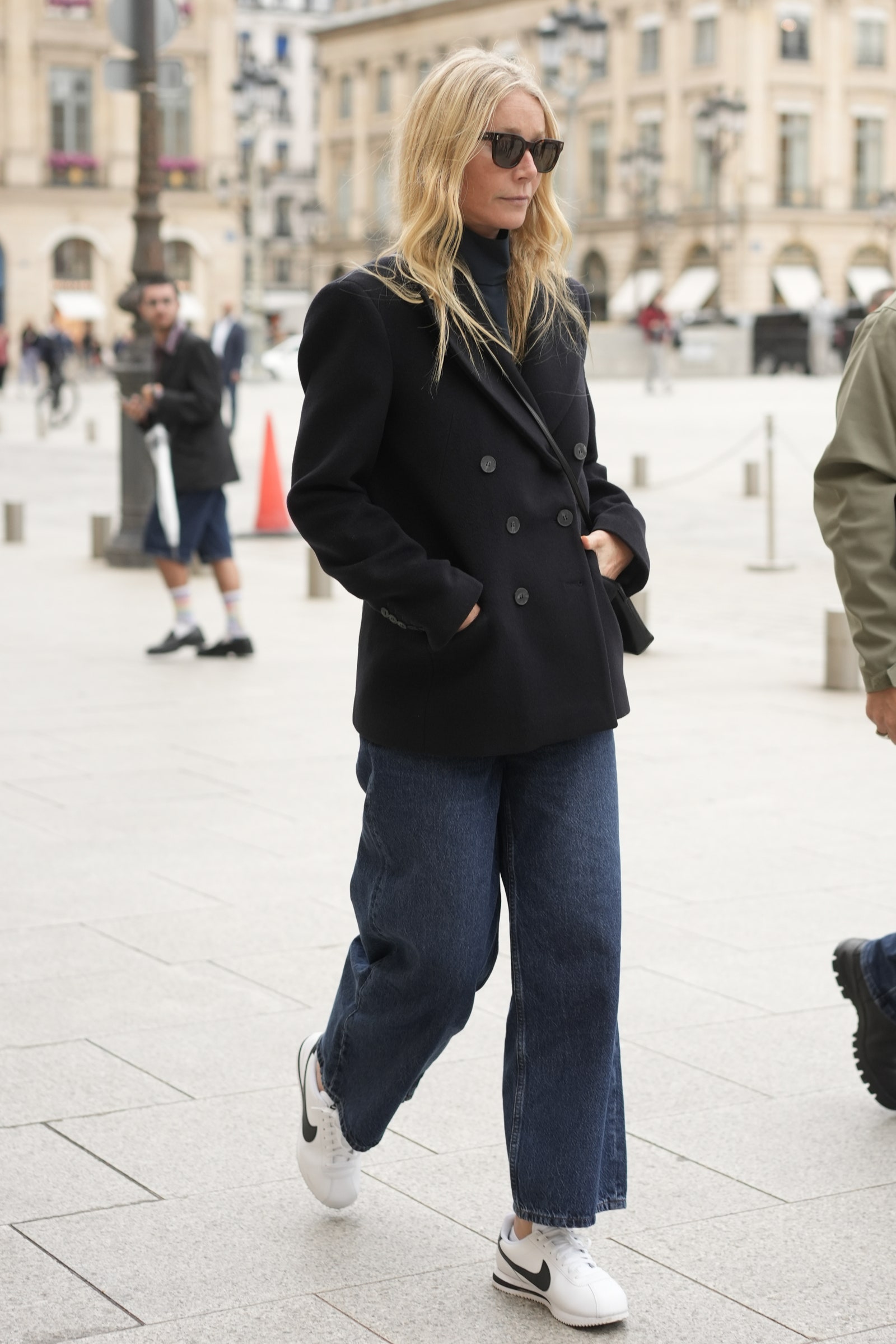 Actress and Goop CEO Gwyneth Paltrow in Pea Coat Denim and Nikes at Fashion Week in Paris.Pictured gwyneth paltrowRef...