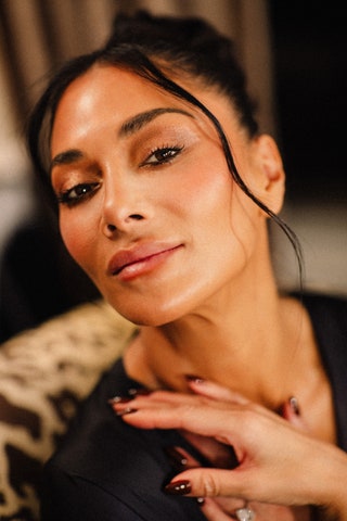 Image may contain Nicole Scherzinger Adult Person Head Face Body Part Neck Photography Portrait and Accessories