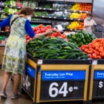 People buy groceries at a Walmart Superstore in Secaucus, New Jersey.