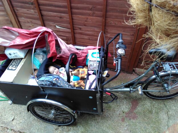 Cargo bike with baby and shopping on board