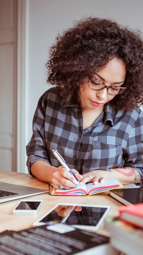 woman on laptop filing taxes