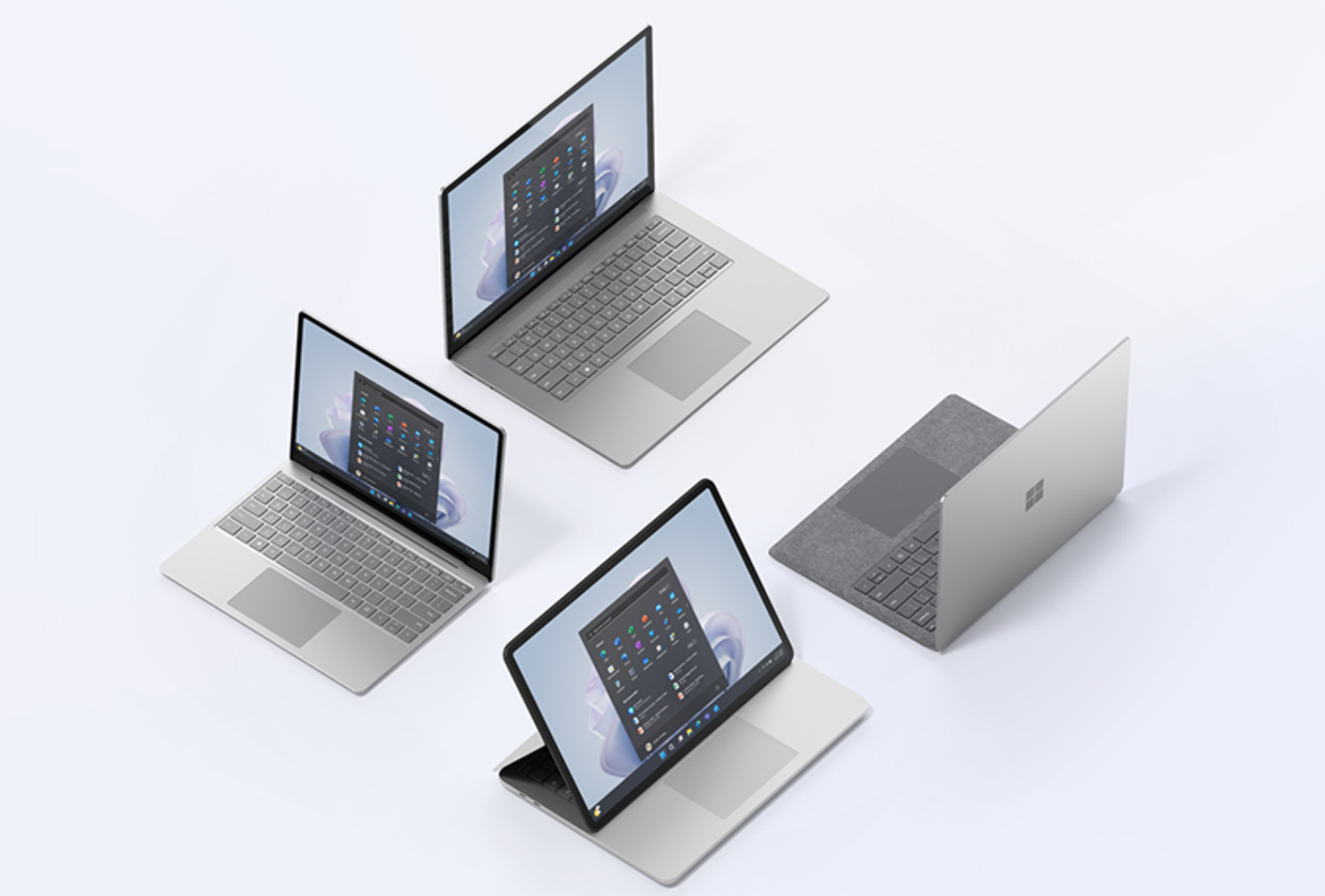 Vier Surface-laptops in verschillende richtingen