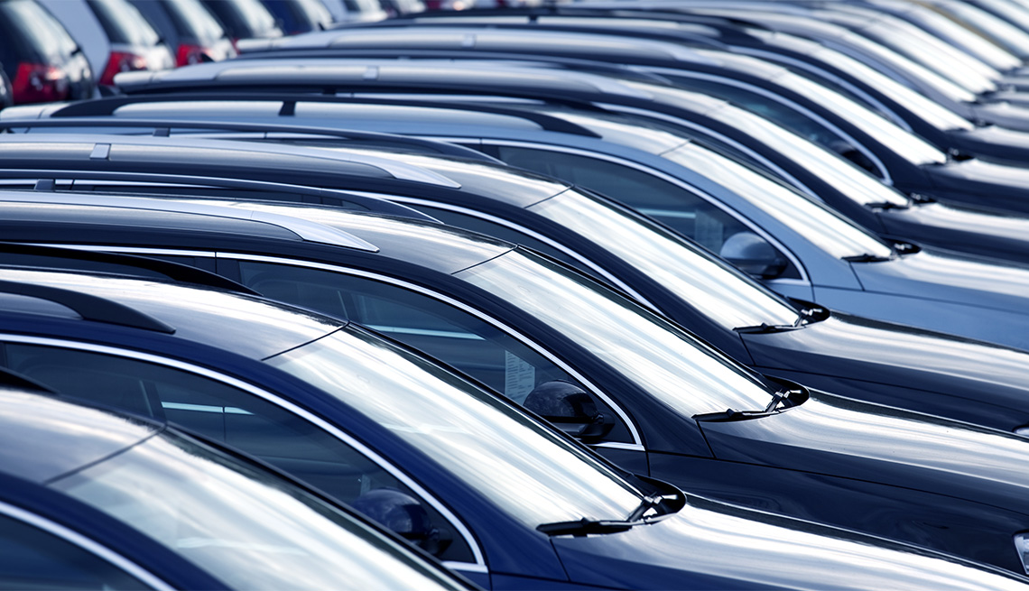 close up with rows of brand new cars