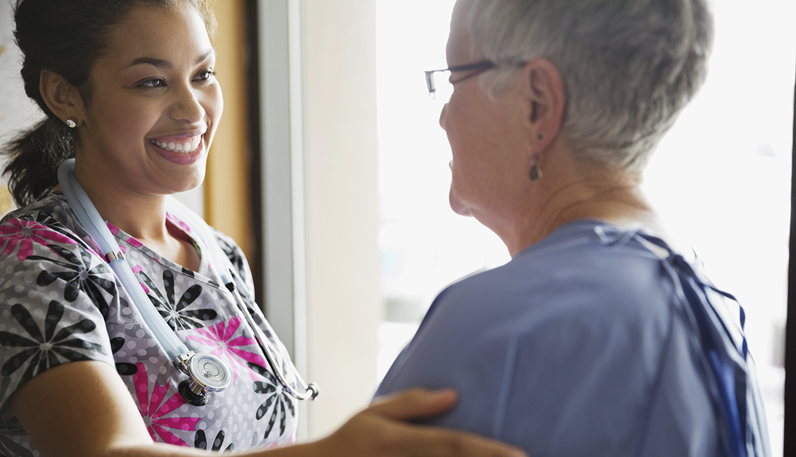 Nurse Attends To Her Patient, AARP Public Policy Institute, Champion Nursing Center