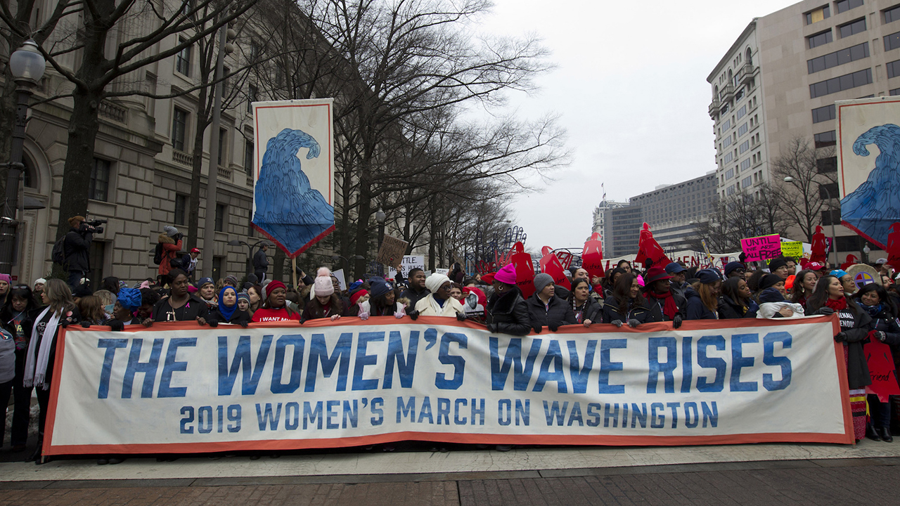 Demonstrators march on Pennsylvania Ave. during the Women's March in Washington on Saturday, Jan. 19, 2019.