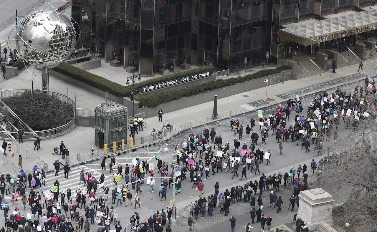 Demonstrators march past the Trump International Hotel and Tower during the Women's March Alliance, Saturday, Jan. 19, 2019, in New York.