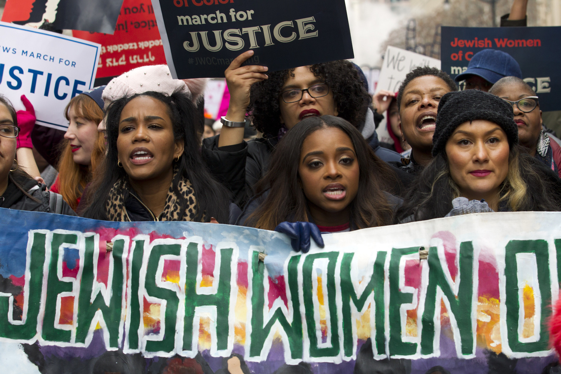 Co-president of the 2019 Women's March Tamika Mallory, center, joins other demonstrators on Pennsylvania Avenue during the Women's March in Washington on Saturday, Jan. 19, 2019.