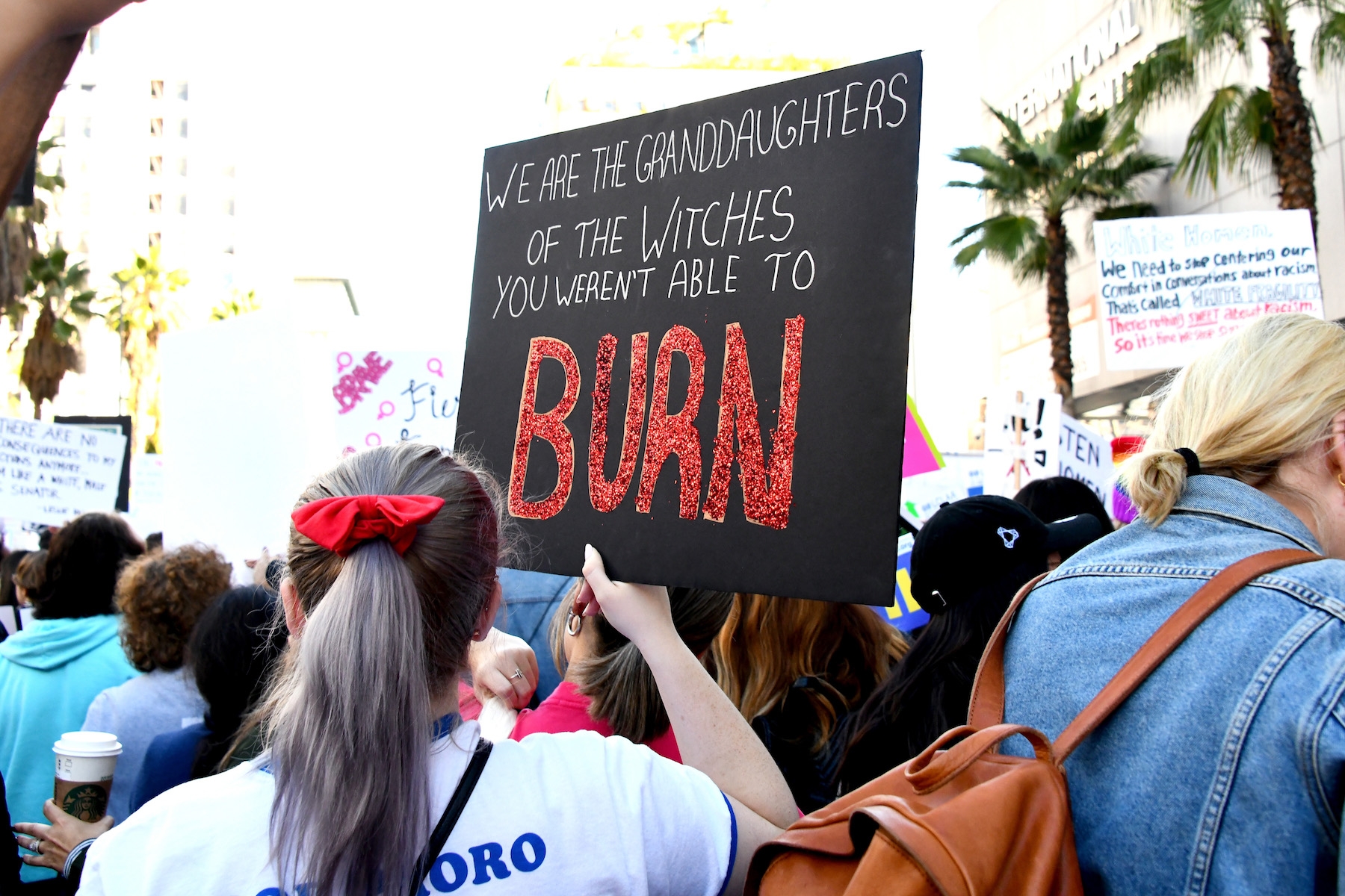 A demonstrator attends the 2019 Women's March Los Angeles on January 19, 2019, in Los Angeles, California.