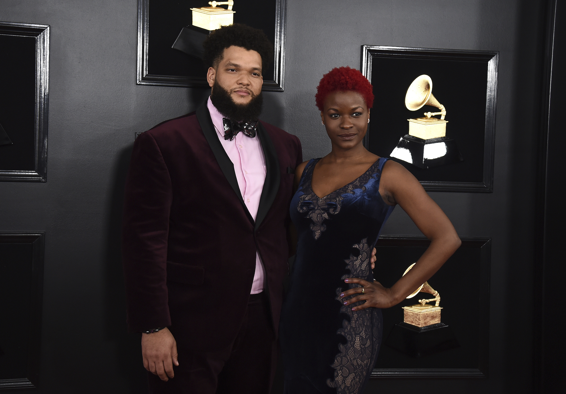 Kris Johnson, left, and Lulu Fall arrive at the 61st annual Grammy Awards at the Staples Center on Sunday, Feb. 10, 2019, in Los Angeles.