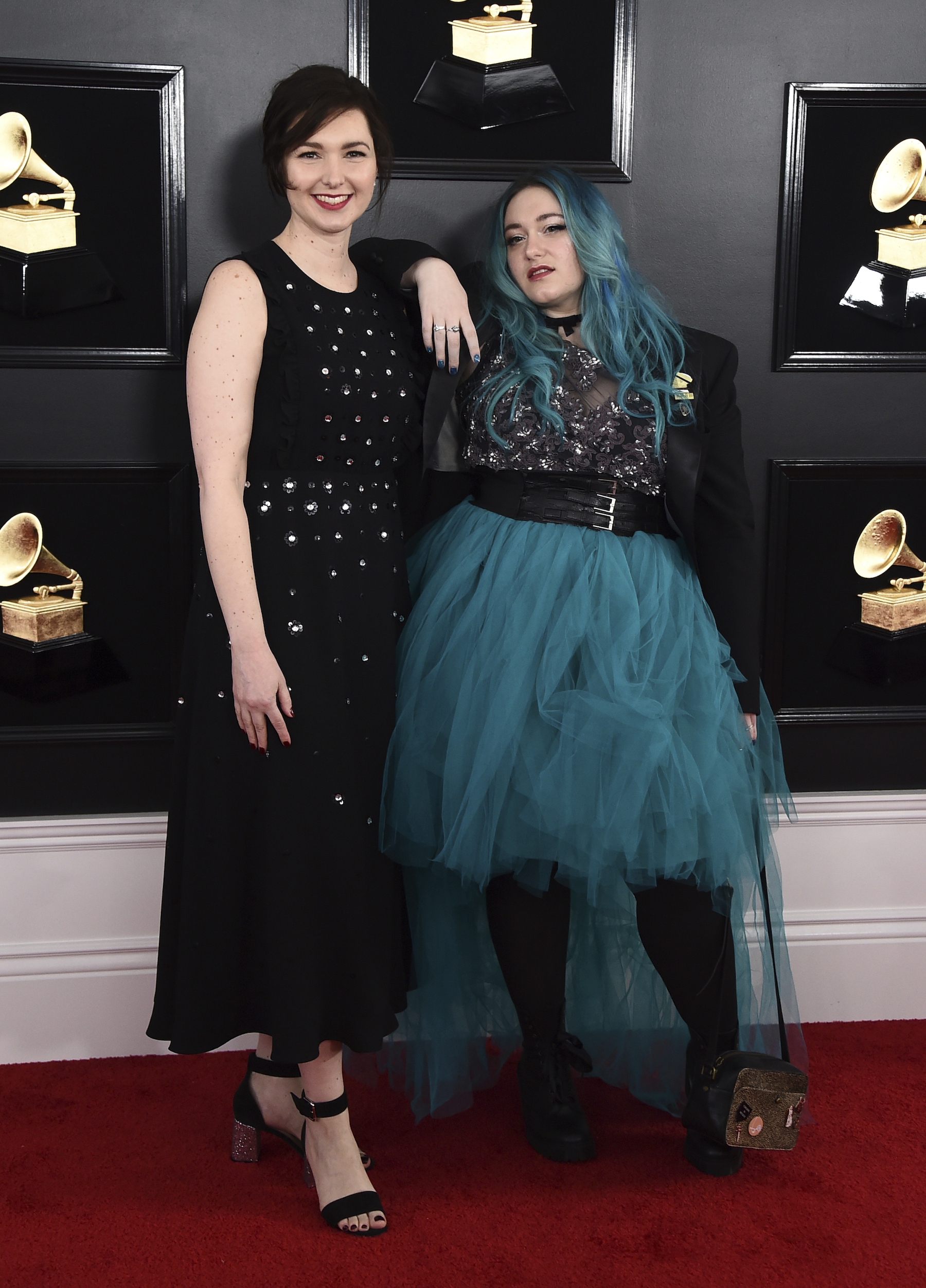 Meghan Foley, left, and Annie Stoll arrive at the 61st annual Grammy Awards at the Staples Center on Sunday, Feb. 10, 2019, in Los Angeles.