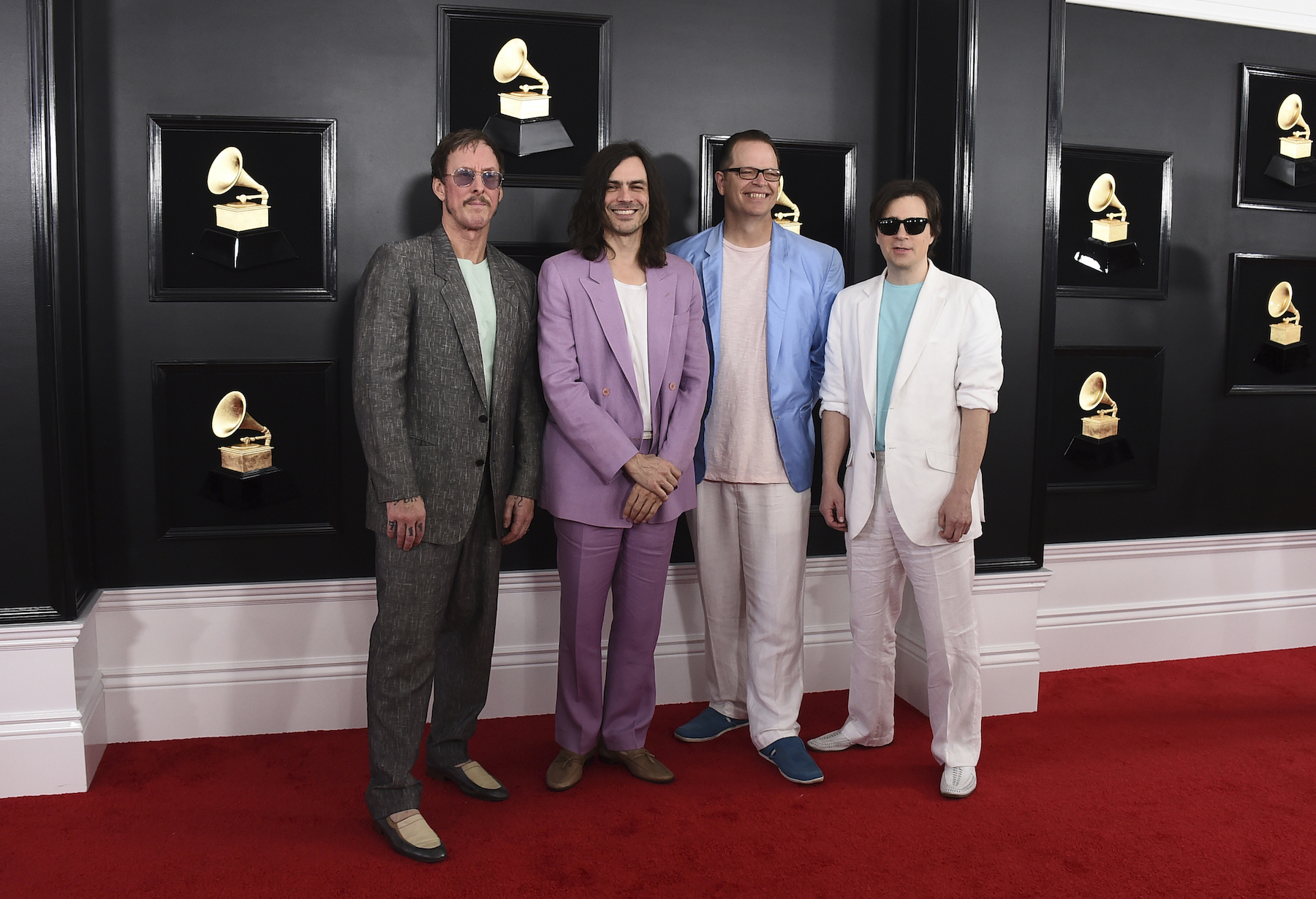 Rivers Cuomo, from left, Brian Bell, Patrick Wilson, and Scott Shriner of Weezer arrive at the 61st annual Grammy Awards at the Staples Center on Sunday, Feb. 10, 2019.