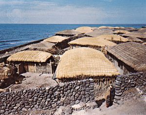 Coastal village on Cheju Island, S.Kor., at the northwestern extent of the East China Sea.