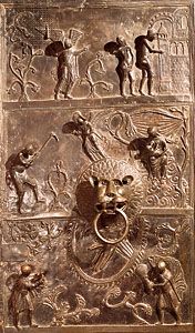 detail of the left bronze door of the Church of St. Michael