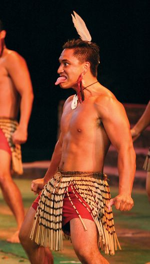 An exaggerated facial expression characteristic of the haka