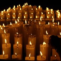 Candles Burning On Table In Church