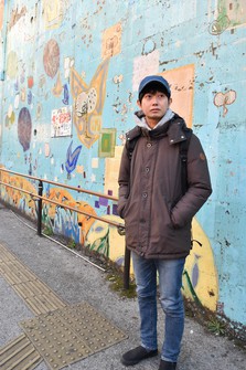 Shoji Morimoto who rents himself out to other people "to do nothing," is seen standing near Nakano Station in Tokyo's Nakano Ward. (Mainichi/Mei Nammo)