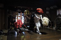 A "kagura" performance with a lion and "Saizo," a clown, is seen at Kataho Hachiman-jinja in Yurihonjo, Akita Prefecture, on April 17, 2022. (Satoshi Takahashi)