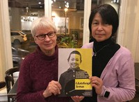 Riho Taguchi, right, and Heidemarie Dann hold the booklet "Glatzkopf Tetsu" ("Tsuruhage no Tetsu"), the German translation of Tetsushi Yonezawa's recounts of his atomic bomb experience in Hiroshima, in this photo provided by Riho Taguchi.