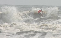 A surfer competes in an event at Kitaizumi Beach in Minamisoma, Fukushima Prefecture, on Sept. 6, 2007, prior to the Great East Japan Earthquake, tsunami and nuclear meltdown disaster. (Mainichi)