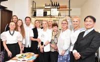 Ukrainian Ambassador to Japan Sergiy Korsunsky, fourth from left, is pictured with staff members at "Restaurant UKRAINE . japan" in Osaka's Abeno Ward on June 26, 2023. Owner Yoji Kawakami is seen at the far right. (Mainichi/Chinatsu Ide) 