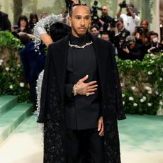 Lewis Hamilton wearing a black beaded Burberry suit at the Met Gala.