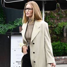 Rosie Huntington-Whiteley wears a beige trench