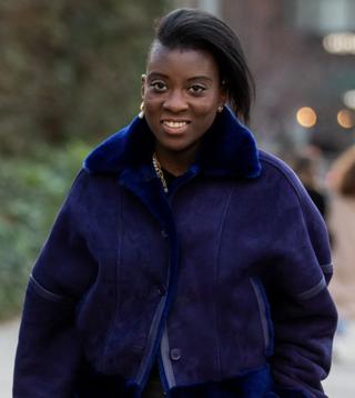 Nikki Ogunnaike wearing a blue coat