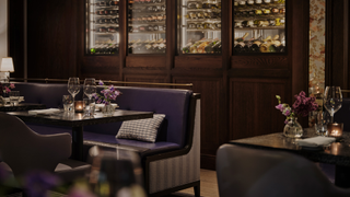 Indigo restaurant at One Aldwych, with banquette seating and large wine fridges