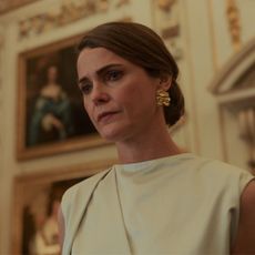 Keri Russell as Kate Wyler, standing in an opulent English mansion, in 'The Diplomat'