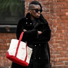 Nikki Ogunnaike wearing a black coat 