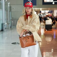 Elsa Hosk at the airport in Paris