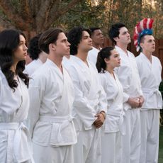 Oona O’Brien as Devon, Tanner Buchanan as Robby Keene, Xolo Maridueña as Miguel Diaz, Khalil Everage as Chris, Mary Mouser as Samantha LaRusso, Gianni DeCenzo as Demetri, Jacob Bertrand as Eli 'Hawk' Moskowitz in Cobra Kai.