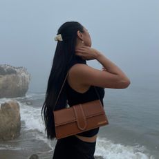 Woman with long hair at the beach