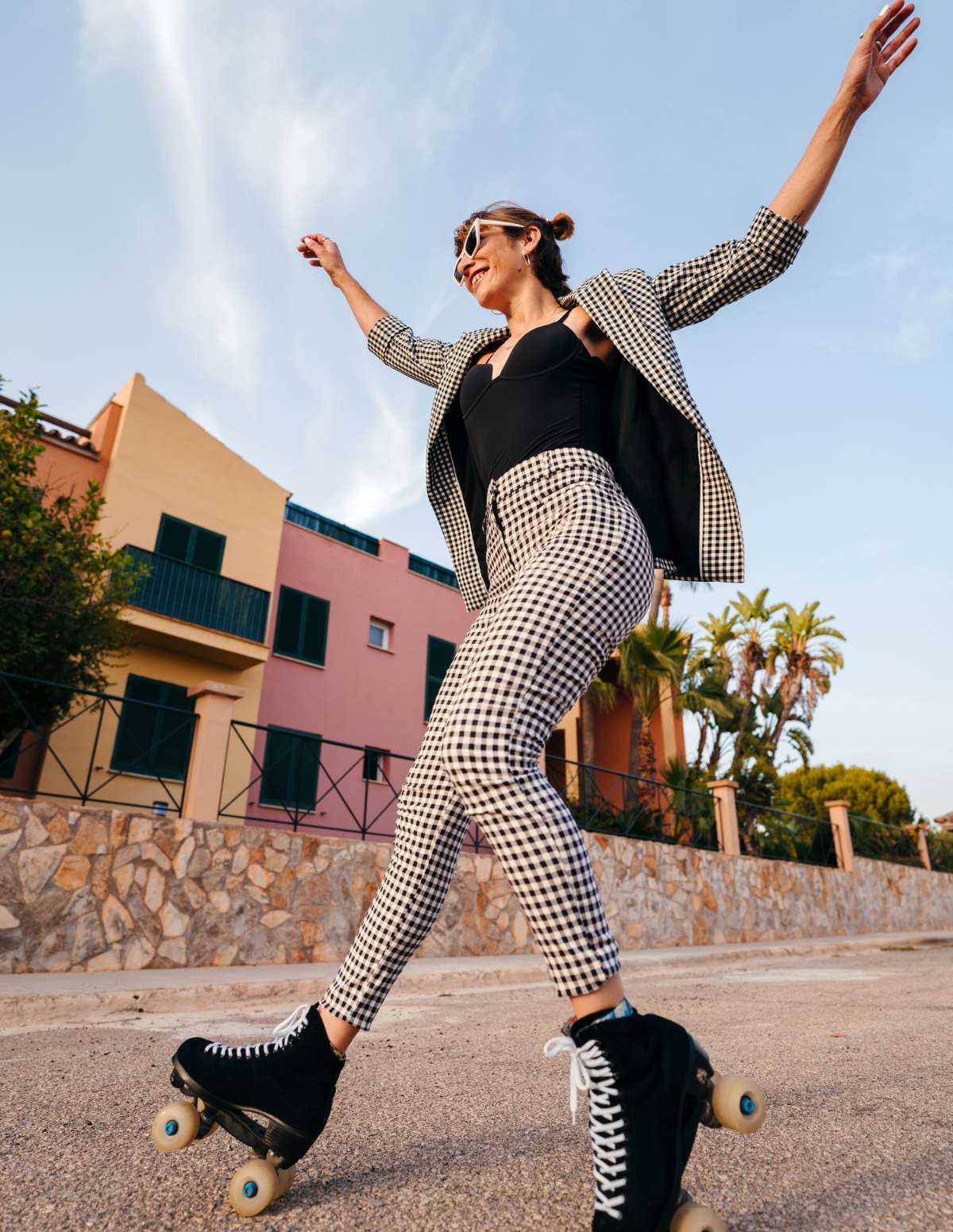 Stylish influencer on rollerskates