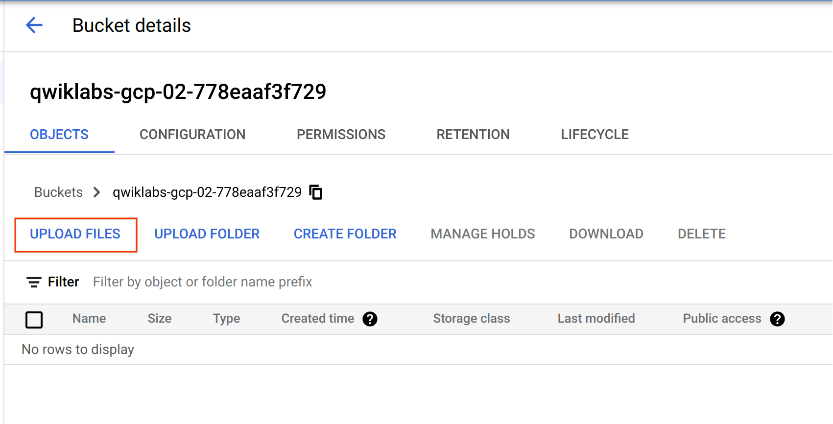 Bucket details page with the UPLOAD FILES button highlighted