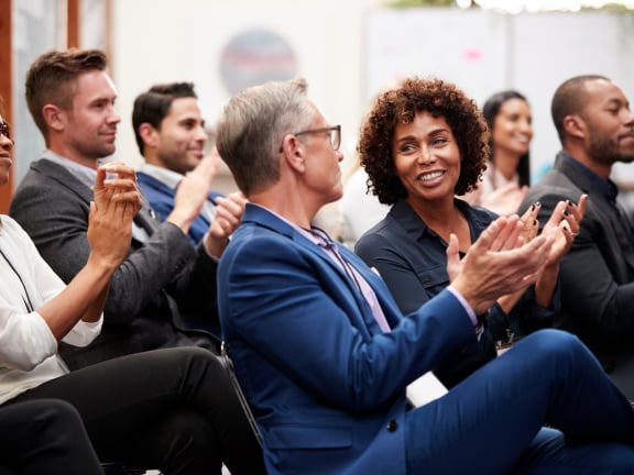 stock photo: a crowd applauding