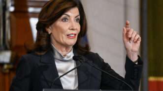 New York Gov. Kathy Hochul addresses a crowd from a lectern. | Hans Pennink/ZUMAPRESS/Newscom