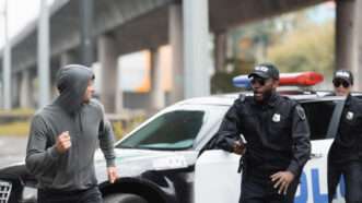 A suspect in a hoodie flees from police under an overpass. | Lightfieldstudiosprod | Dreamstime.com