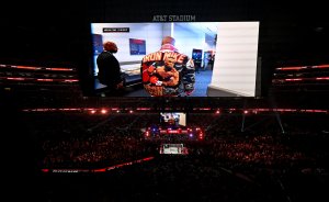 Mike Tyson arrived for Netflix streamed fight with Jake Paul is displayed to cheers on big screen at AT&T Stadium in Arlington, Texas