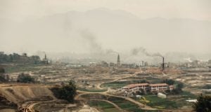 Industrial landscape with smoking towers