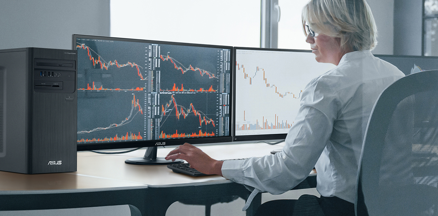 A business woman is monitoring run chart shown on ASUS monitors in office.