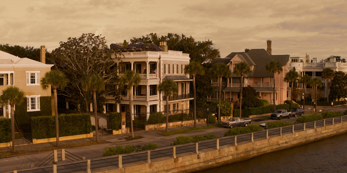 Exterior shot of a three-story house with columns