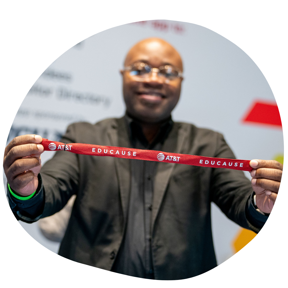 Person holding up a branded lanyard